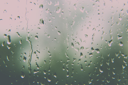 Rain water drop on glass of windowの写真素材