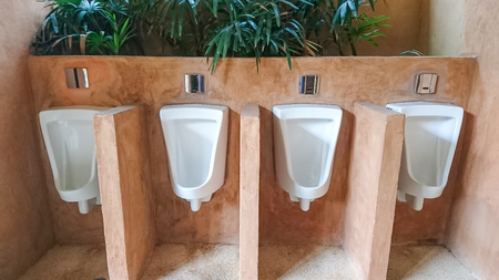 Urinals row male toilet in garden styleの写真素材