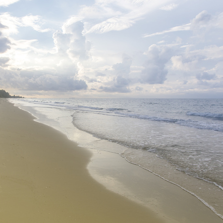 Ocean wave and tropical beach with skyの写真素材
