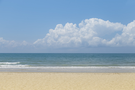 Ocean wave and tropical beach with skyの写真素材