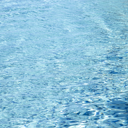 Water wave in swimming pool for backgroundの写真素材