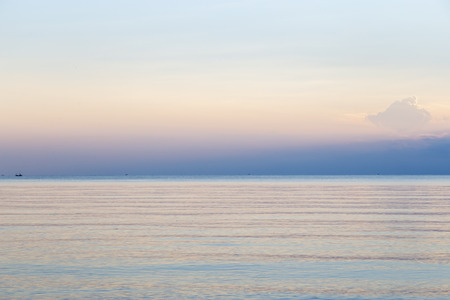 Sunset with sky on the tropical seaの写真素材