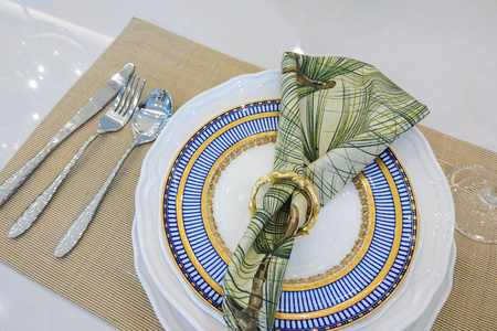 Served plate with napkin on the tableの写真素材