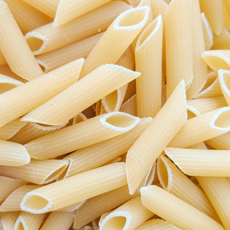 Ingredient background of raw pasta for italian foodの写真素材