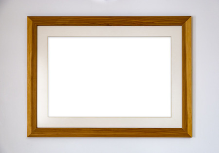 Blank photo wood frame on the wallの写真素材