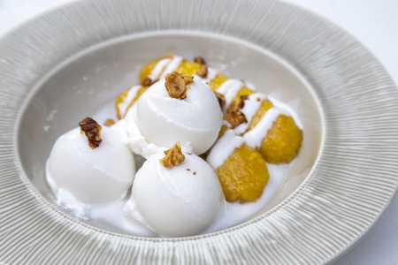 Coconut ice cream with banana in syrup, Thai dessertの写真素材