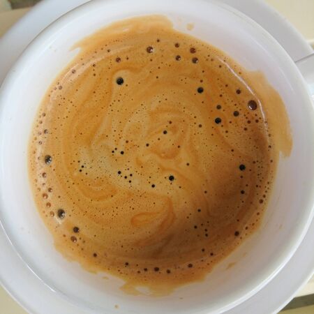 Top view of coffee foam in cupの写真素材