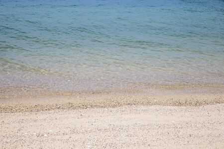 Sea soft wave and sand beachの写真素材