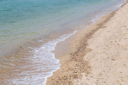 Sea soft wave and sand beachの写真素材