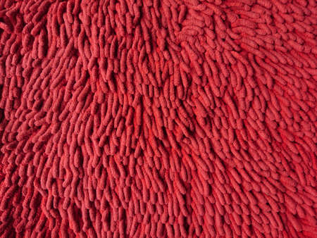 Detail of red fabric carpet for backgroundの写真素材