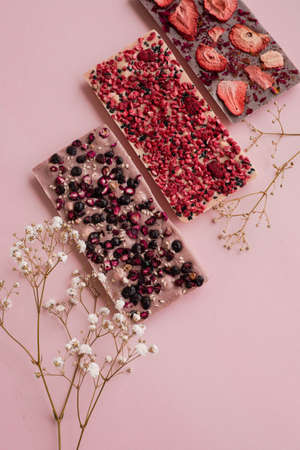 3 types of chokolate bar - raw dessert with dry berries