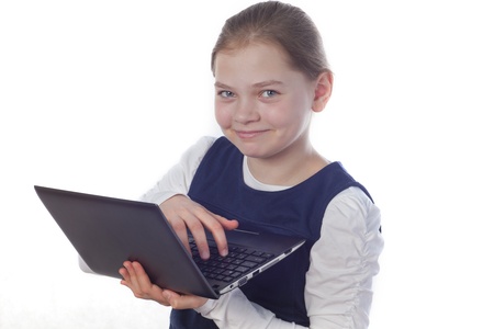 a smiling girl with a netbook on the white backgroundの写真素材