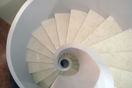 a spiral staircase from the white marble  top view の写真素材
