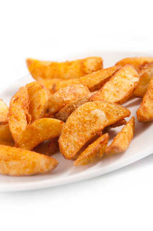 French fries potato on a white plateの写真素材