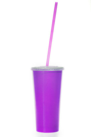 glass of purple paper with a tube on a white backgroundの写真素材