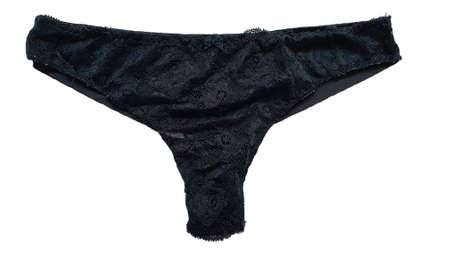 Worn female underwear isolated. Luxury elegant lace black worn women's panties, close-up, isolated...