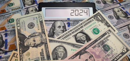 Elections and crisis in the new year 2024. Calculator on the background of US dollar banknotes....