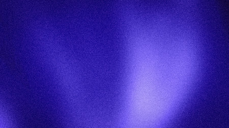 Vibrant 4K abstract gradient in mesmerizing blue and purple hues, featuring a luminous grainy...