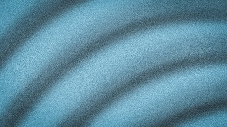 Cinematic 4K abstract background with dramatic shadow waves on a deep teal blue to black gradient, featuring a heavy grainy blur textureの写真素材