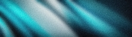 Mesmerizing abstract grainy texture background. Dynamic diagonal light effects with a vivid cyan, blue, gray, and black gradient. Premium 4K template for banner and wallpaperの写真素材
