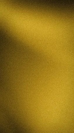 Abstract grainy gradient background with rich gold, yellow, and deep bronze tones. A blurred,...