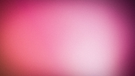 Vibrant pink and coral grainy abstract gradient background with bright light leak effect