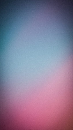 Soft pastel pink and blue grainy gradient background with airy noise texture and blur