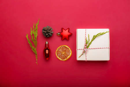 Christmas composition on red background .. Christmas gift. Flat lay, top viewの写真素材