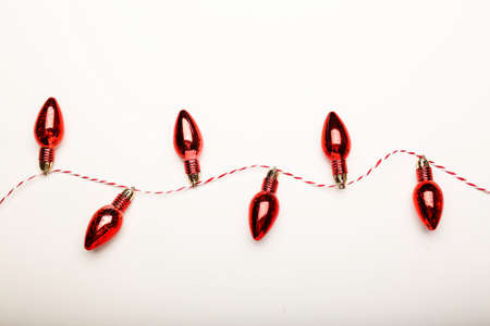 Christmas composition. Christmas red toys on a white background. Flat lay, top view