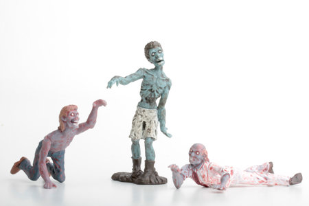 Plasticine figures of zombies on on a white background.の写真素材