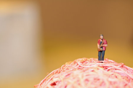 Miniature people : sax player playing saxophoneの写真素材