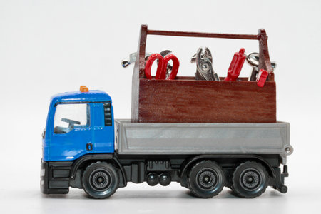 truck with tools on a white background, closeup of photoの写真素材