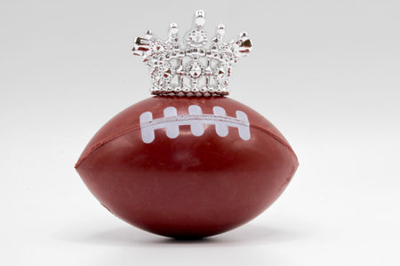 American football ball with a crown on a white background, close-upの写真素材