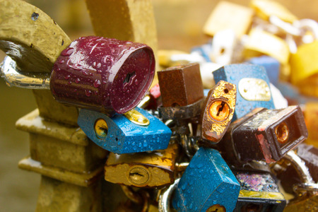 locks on the bridge in Praha. locks with drops on the bridge. symbol of eternal love and relationshipの写真素材