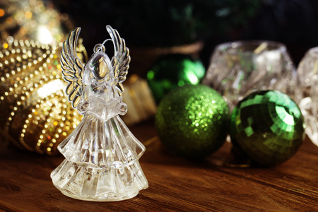 Crystal Angel on the background of Christmas balls. new Year decoration. Christmas ornaments, christmas decorationの写真素材