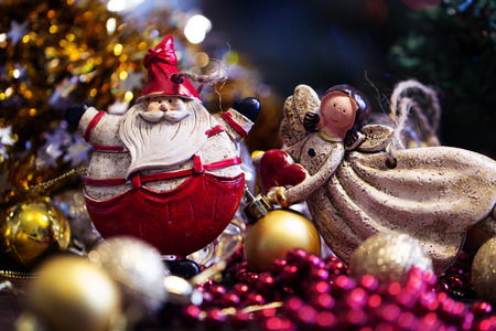 toy of Santa Claus and  Christmas angel. Santa Claus christmas decoration.Christmas greeting card.Christmas symbolの写真素材