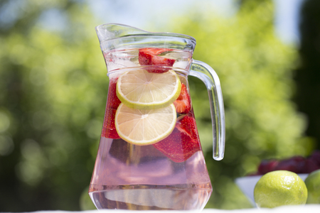 Strawberry lemonade drink, refreshing summer mojito with strawberries, lime and mint. Lemonade set. Summer drinks - Lemonade, mojito and strawberry lemonadeの写真素材