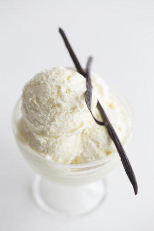 Glass with delicious vanilla ice cream on table. Homemade Ice Cream, copy space.の写真素材