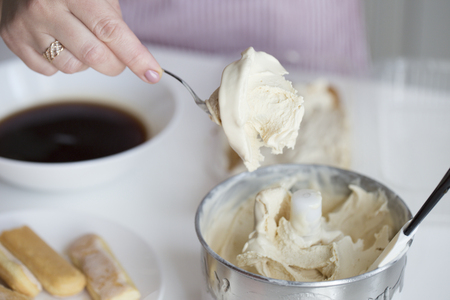 process of ice cream-tiramisu preparation. Tiramisu makingの写真素材
