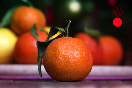 Tangerine or clementine with green leaf. Tangerines - oranges, mandarins, clementines, citrus fruits with leavesの写真素材
