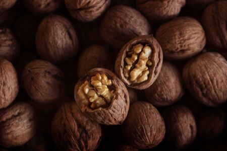 Heap of walnuts. Walnuts Background Texture. Background of fresh walnuts 