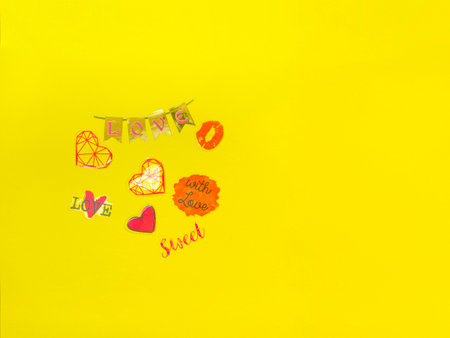 Concept for love stories and for Valentines Day. Gift box in the form of a heart on a yellow...