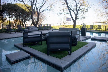 Beautiful relaxation and comfort area in the middle of the pool of a five star hotel in Johannesburg in South Africa, this is the ideal place to rest and recover for travelers, tourists and executivesの写真素材