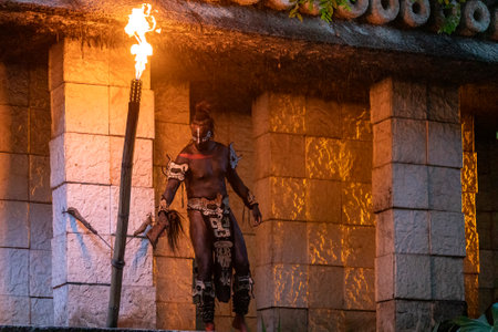 Xcaret, Mexico, December 24, 2022 - Large Mayan panther warrior protecting the entrance to a Mayan village in Mexico's Mayan Riviera, at the Xcaret park which is a very popular place for travelers.のeditorial素材