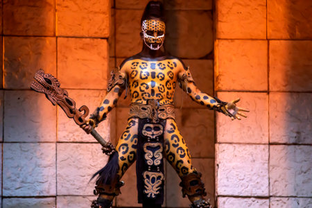 Xcaret, Mexico, December 24, 2022 - Mayan jaguar warrior ready to fight at the entrance of a Mayan village in Mexico's Mayan Riviera, in the Xcaret park, which is a very busy place for travelers.のeditorial素材
