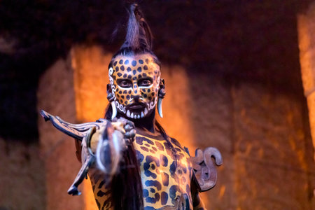 Xcaret, Mexico, December 25, 2022 - Threat of great Mayan jaguar warrior in the rainforest protecting the ancient Mayan civilization with its ruins and cities such as Xcaret Park.のeditorial素材