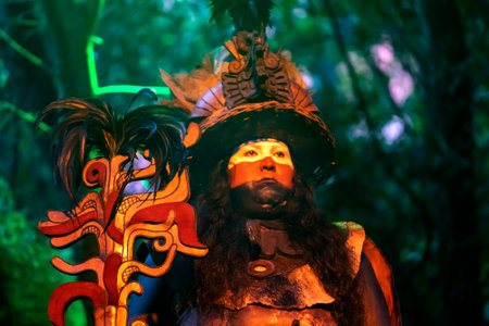 Xcaret, Mexico - January 25, 2023: Mayan sorcerer in Xcaret park located in the tropical jungle of the Mayan Riviera, where the Mayans lived, ancient archaeological and symbolic civilization.のeditorial素材