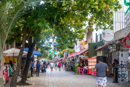 Carmen beach; Mexico; March 31, 2023: The fifth avenue of the city of Playa del Carmen in Mexico, is the busiest street for tourists visiting this Mexican city.のeditorial素材