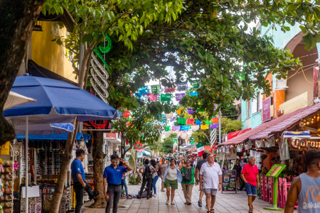 Playa del Carmen, Mexico, April 2, 2023: The fifth avenue of the Mexican city of Playa del Carmen is the most commercial street of this Mexican town which is full of tourists and foreigners.のeditorial素材