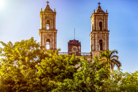 Cathedral and church of San Servacio in the city of Valladolid in America specifically in the Yucatan Peninsula (Mexico), is built with its towers and respective bell towers that reach the blue sky.の写真素材